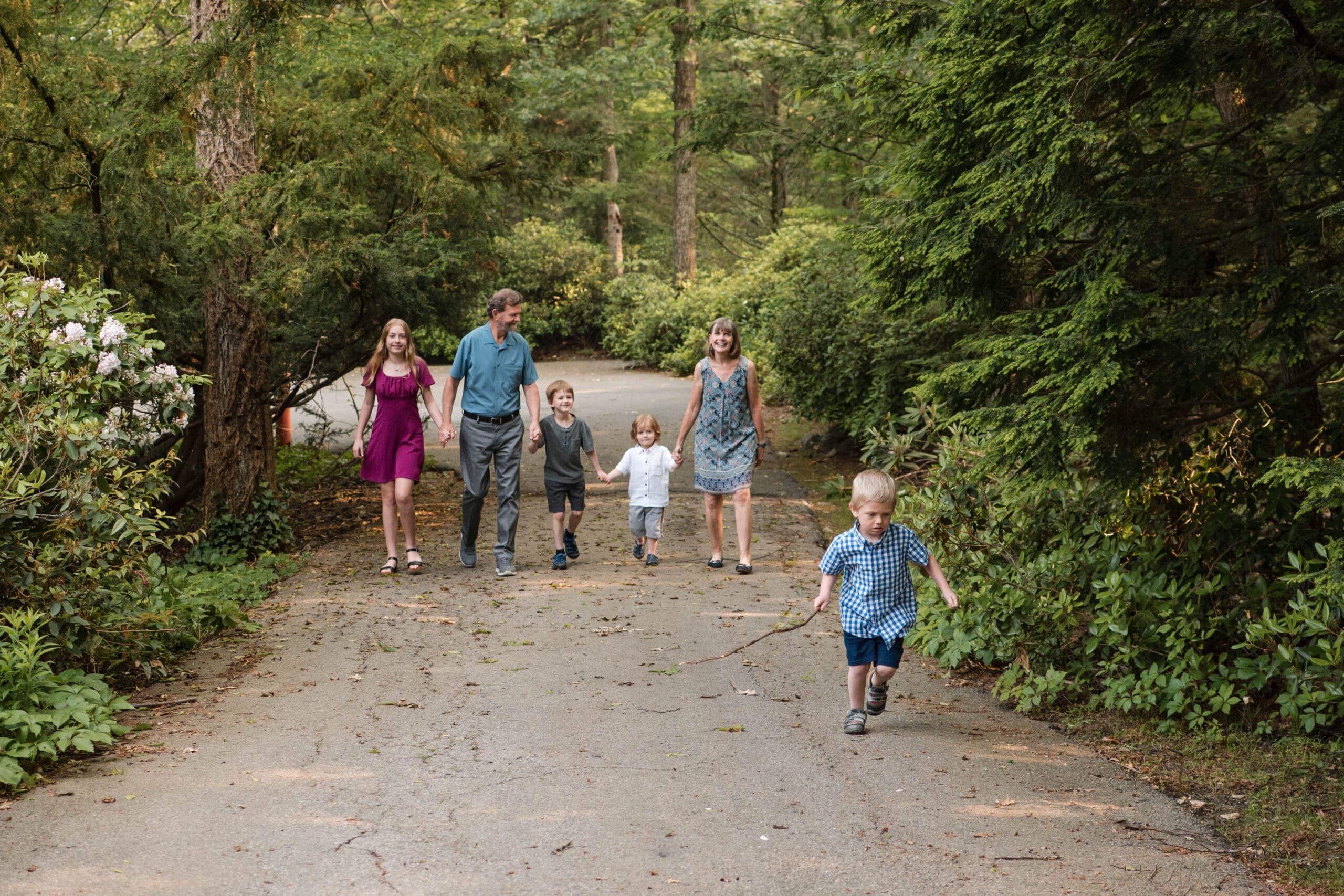 Grandparents walk with their grandchildren at Whip Hill Park in Stoneham